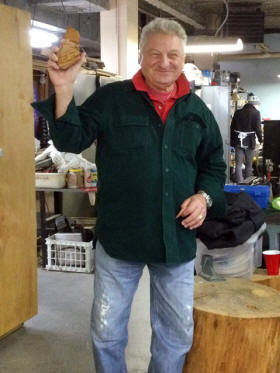 Portrait of Ed Vanderlan, WCRA founder, holding one of his favorite specimens